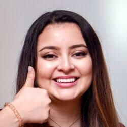 Glenda's conservative smile makeover with orthodontics, whitening, and composite bonding veneers